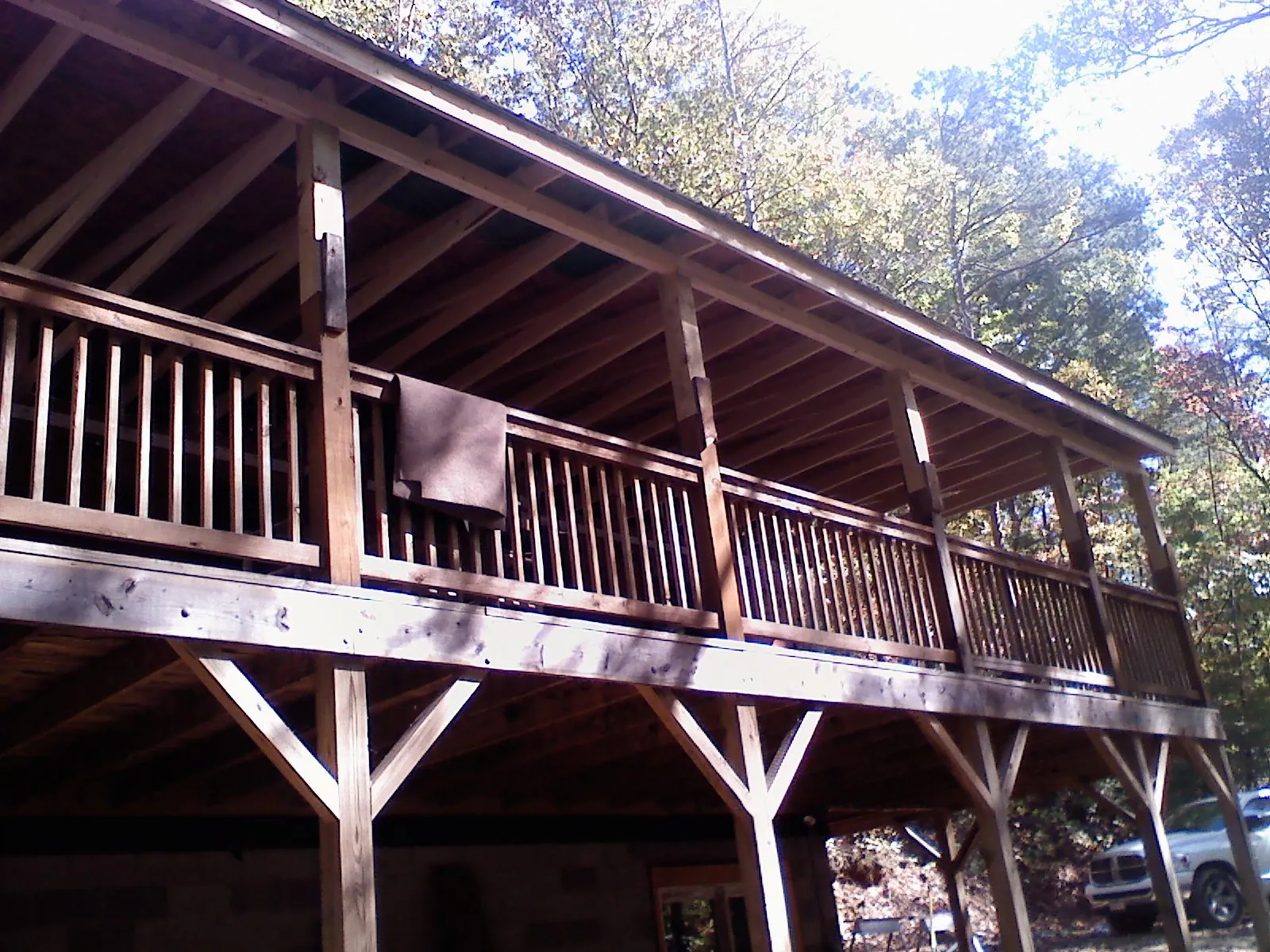 Timber framing under a new elevated porch and deck — Roof Leak Repair in Arkansas City by Roofing Brothers